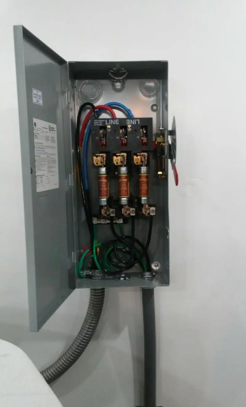 Three-phase disconnect switch installed for Smoke Detector Installation in Mims